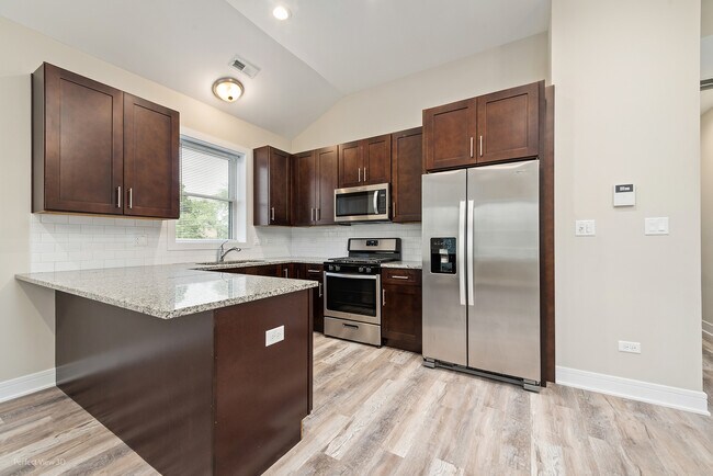 Foto del edificio - 6450 S Ellis Ave