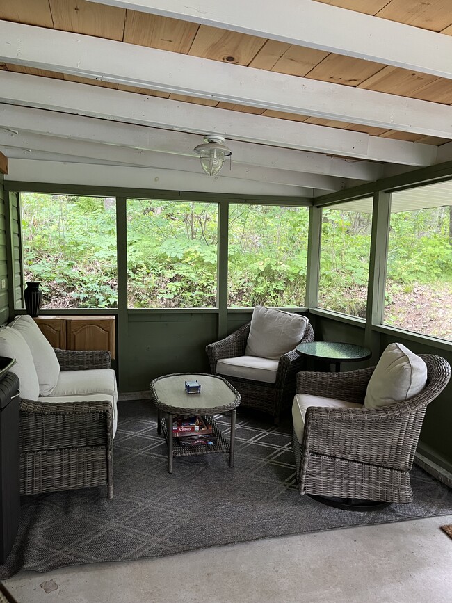 Screened porch seating - 948 Grant Lake Ln SW