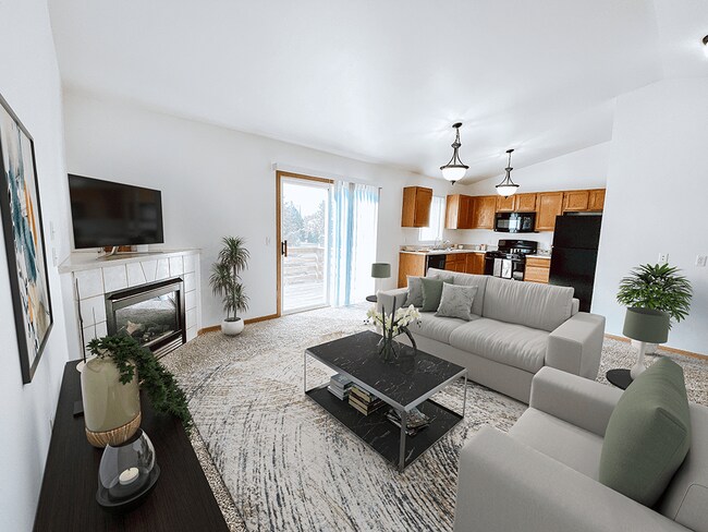 Spacious Living Room with Fireplace - Bloomfield Townhomes