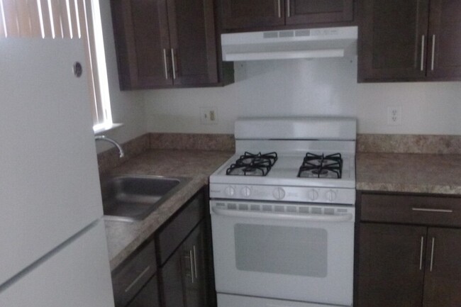 Update cabinets & Appliances - Kensington Place