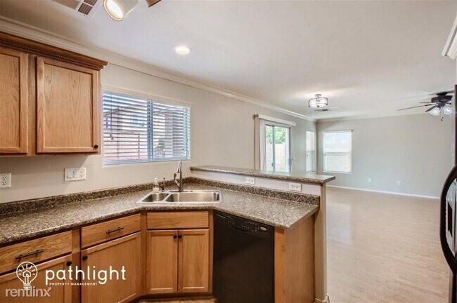 Foto del edificio - 4 br, 2 bath House - 22264 W Desert Bloom ...