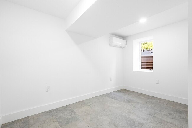 Building Photo - 829 John F. Kennedy Blvd