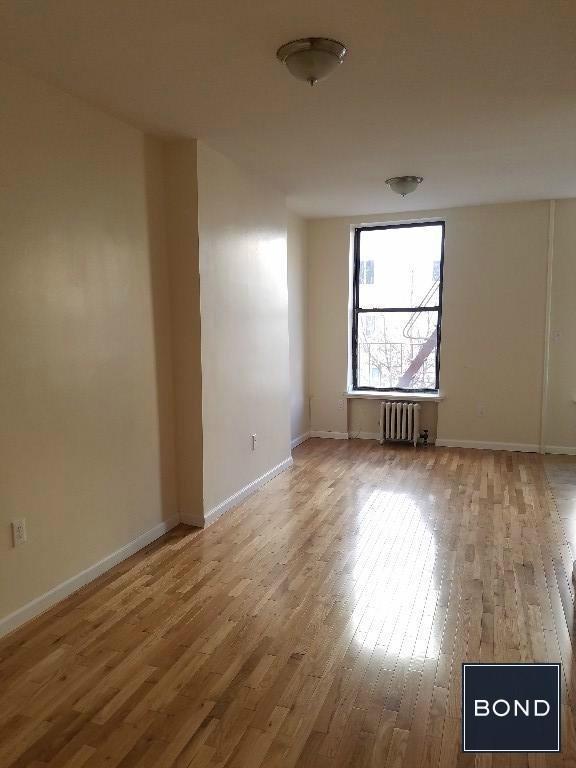 Building Photo - 153 E 117th St