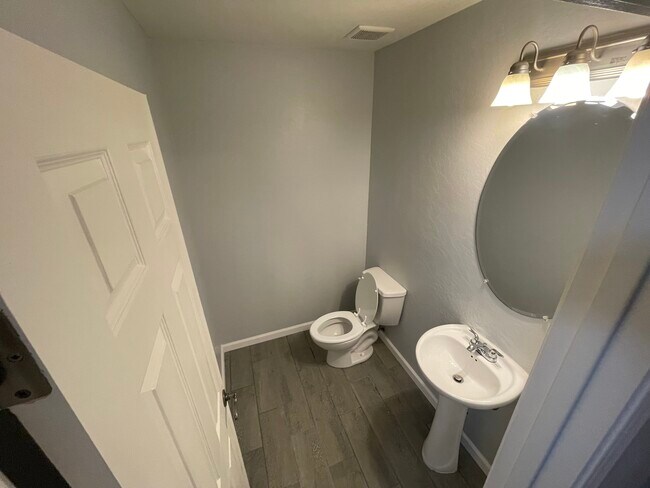 Downstairs powder room - 7233 S 39th Dr
