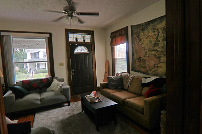 View of front door and living room from dining room - 374 E Oakland Ave