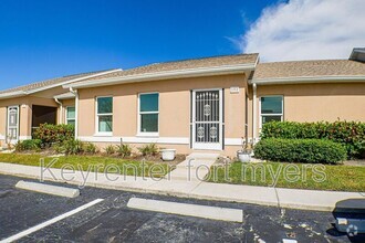 Building Photo - 16841 Sanibel Sunset Ct