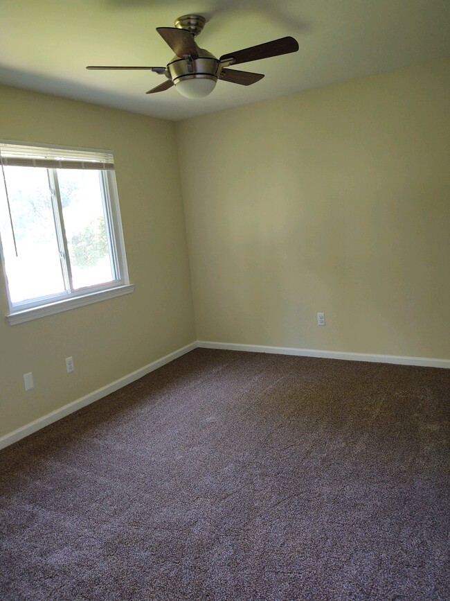 Second bedroom, including ceiling fan with remote control - 41247 S. Woodbury Green Dr.