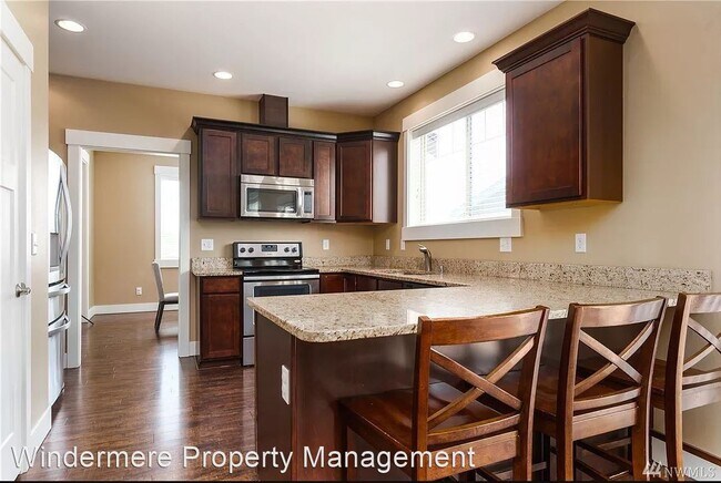 Building Photo - 4 br, 2.5 bath House - 5649 Ariel Ct
