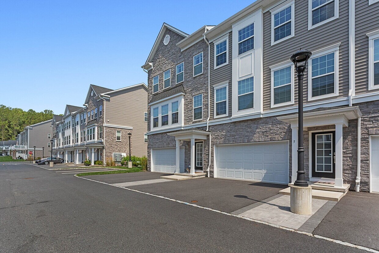 Photo - "Experience Luxury Living: Spacious 3-Bed Townhouse with Finished Bonus Room & Quartz Countertops at
