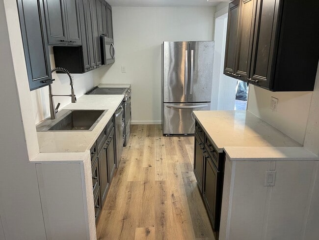 Building Photo - Newly Renovated 4-Bedroom Ranch with Basem...