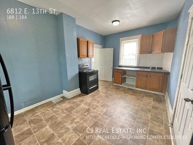 Foto del edificio - 6812 E 13th St