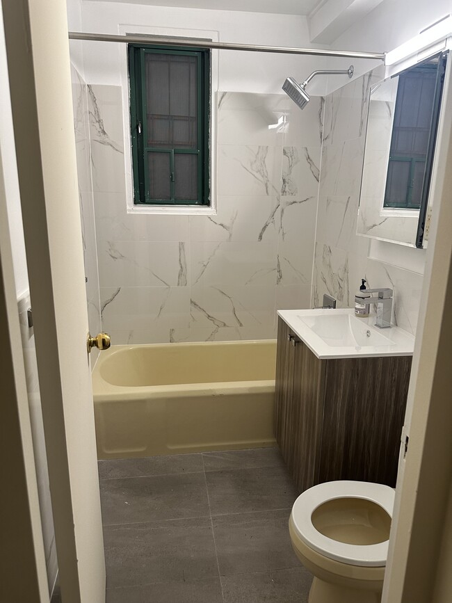 Freshly Renovated Bathroom - 1680 Metropolitan Ave