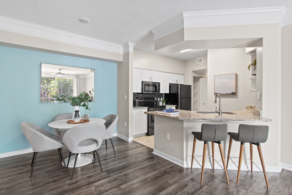 Kitchen and Dining Table at Verona at Boynton Beach Apartments in Boynton Beach, FL 33426 - Verona at Boynton Beach