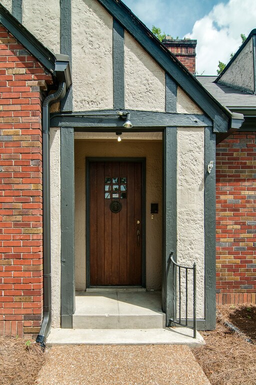 Photo - Classic Green Hills Tudor House