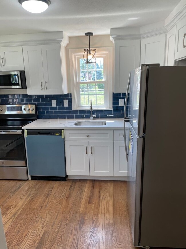 Building Photo - The Blue Backsplash Cape