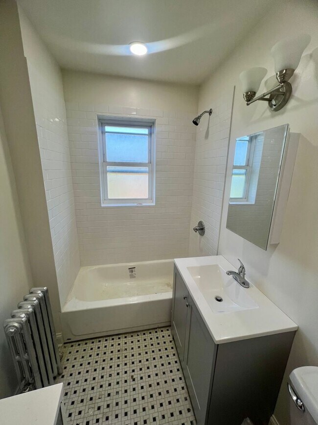 Building Photo - Brand New Renovation! 3 BR/ 2 BA On Quiet ...