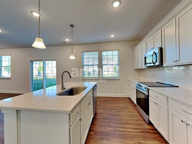 Building Photo - 8331 Merlin Dr