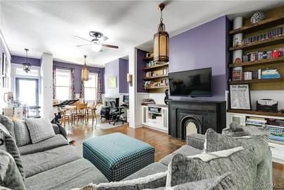 Open living room with built in shelving and desk. - 424 1/2 S Pine St