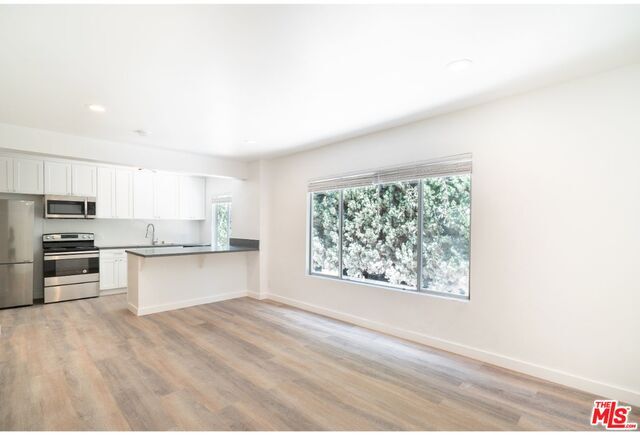 Foto principal - 1036 N Genesee Ave