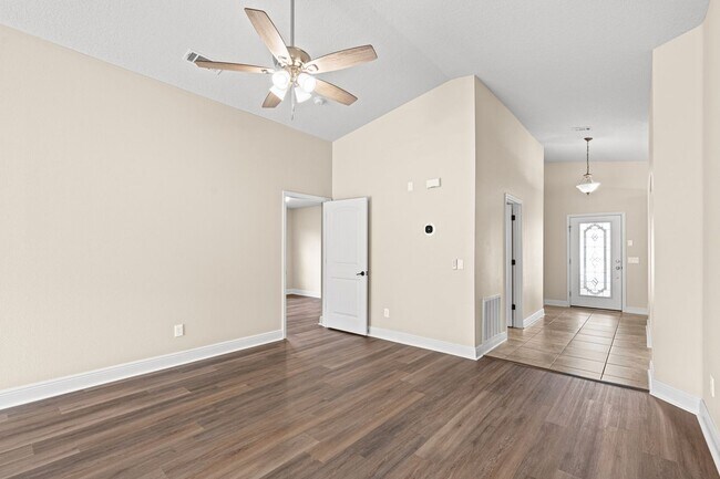 Building Photo - Spacious 4-Bedroom Home - Fenced Backyard