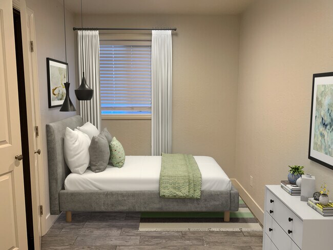 En la habitación más pequeña cabe una cama matrimonial y en las otras dos una cama Queen. - 1534 Tyler St