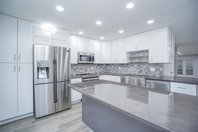Foto del edificio - 14465 Misty Meadow Ln
