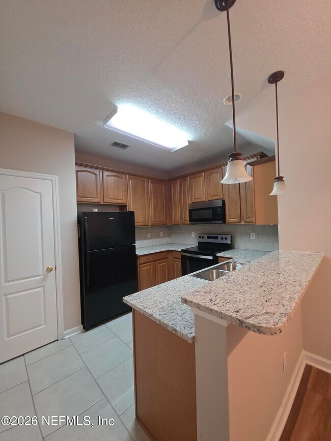 Building Photo - 6070 Bartram Village Dr