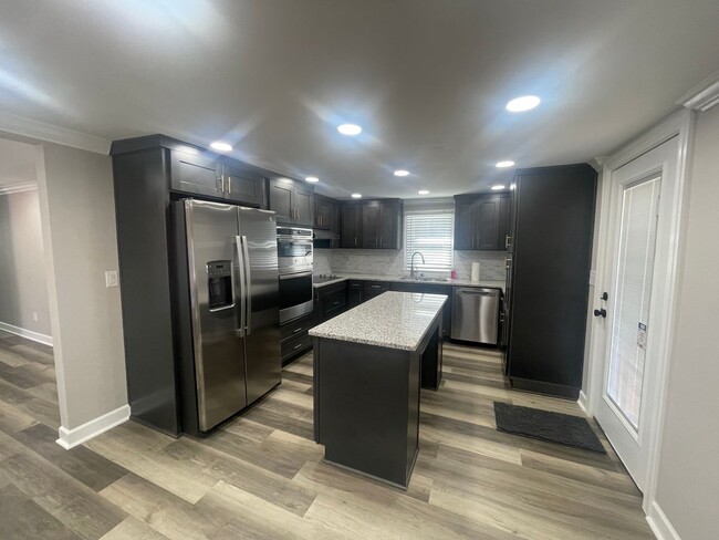 Building Photo - Newly Completely Renovated 3/2 in Quiet Area!