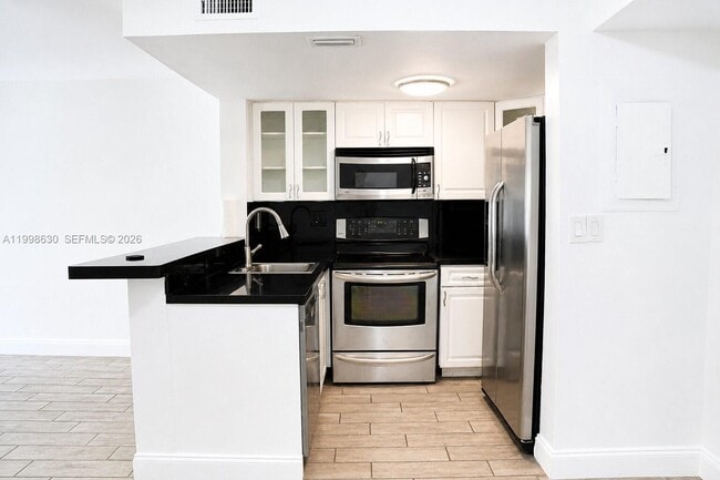 Building Photo - 8695 NW 6th Ln
