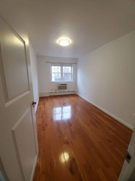 Building Photo - 48-49 47th Street Unit