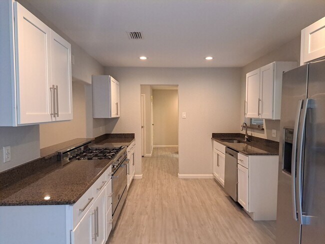 Photo - Updated 4 Bedroom / 2 Bath / 2 Car Garage House