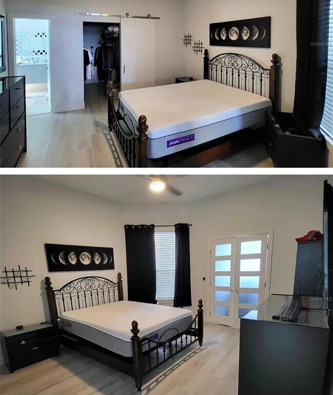 Master bedroom with barn door to large closet - 3127 W Sligh Ave