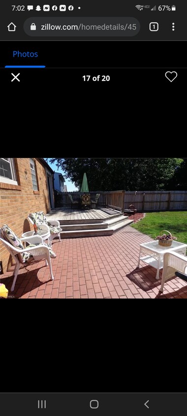 Fenced in backyard with deck and pati - 4560 7th St NW