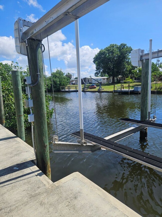 Building Photo - Port Charlotte Waterfront salt water pool annual rental