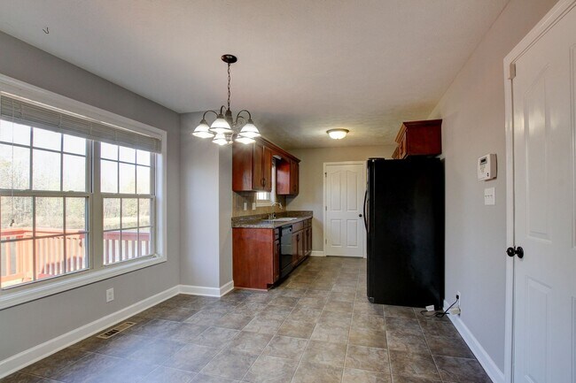 Building Photo - Amazing Brick Front Ranch Home With Hardwo...