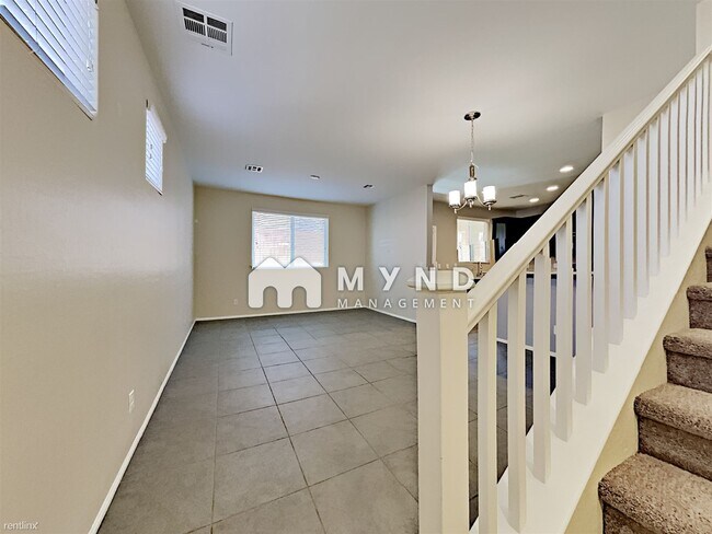 Building Photo - 9345 Pink Stargazer Ave