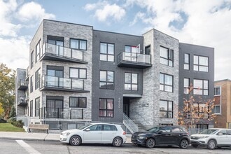 Building Photo - 6600 Av. de Darlington