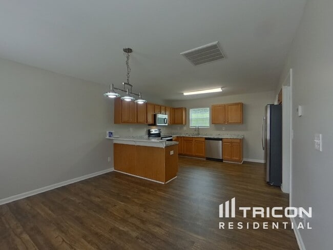 Foto del edificio - 6937 Wandering Creek Dr