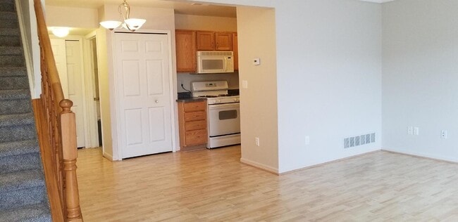 Building Photo - 2 Bedroom, 1.5 Bath Townhouse w/ Garage & Huge Master Bedroom. Full Sized Washer & Dryer In Unit.