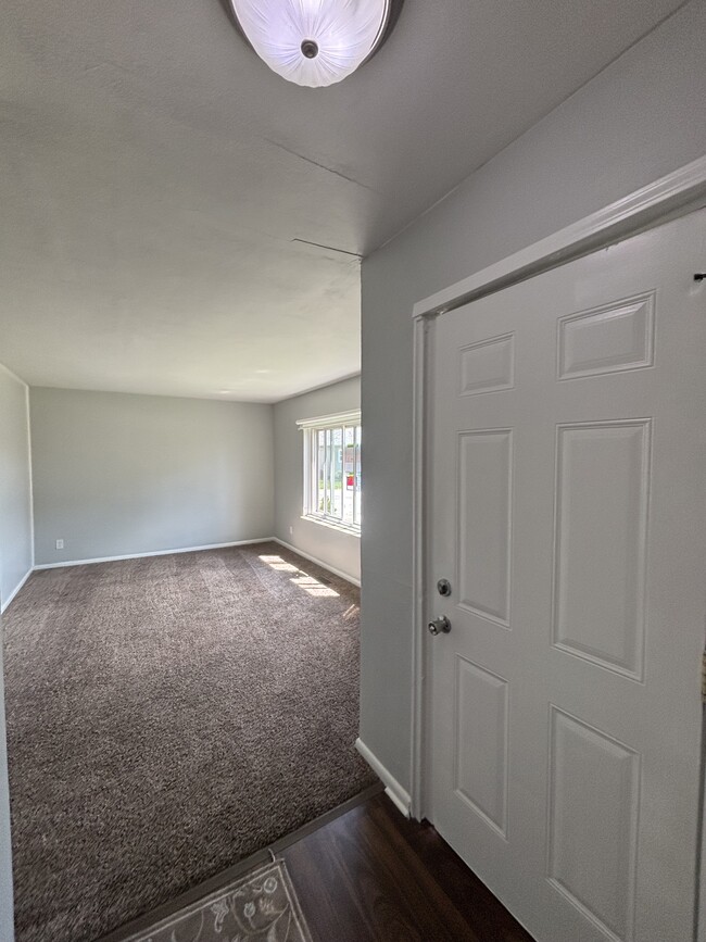 Front room with Large window for bright light - 864 Harlan St