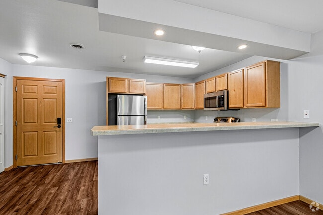 1BR, 1.5BA - 838SF - Kitchen - McComb Place Apartments