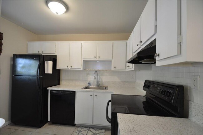 Foto del edificio - 105 Gardens Dr