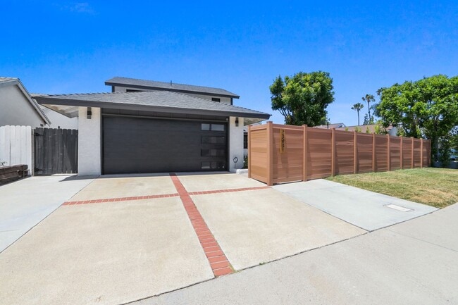 Building Photo - Renovated Lake Forest Home with Expansive Yard & Modern Finishes