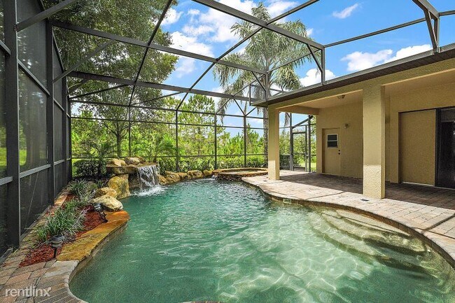 Building Photo - 4 br, 3 bath House - 24728 Calusa Blvd.