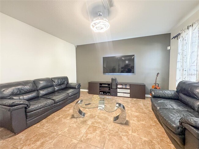 Building Photo - 5594 Angelonia Terrace
