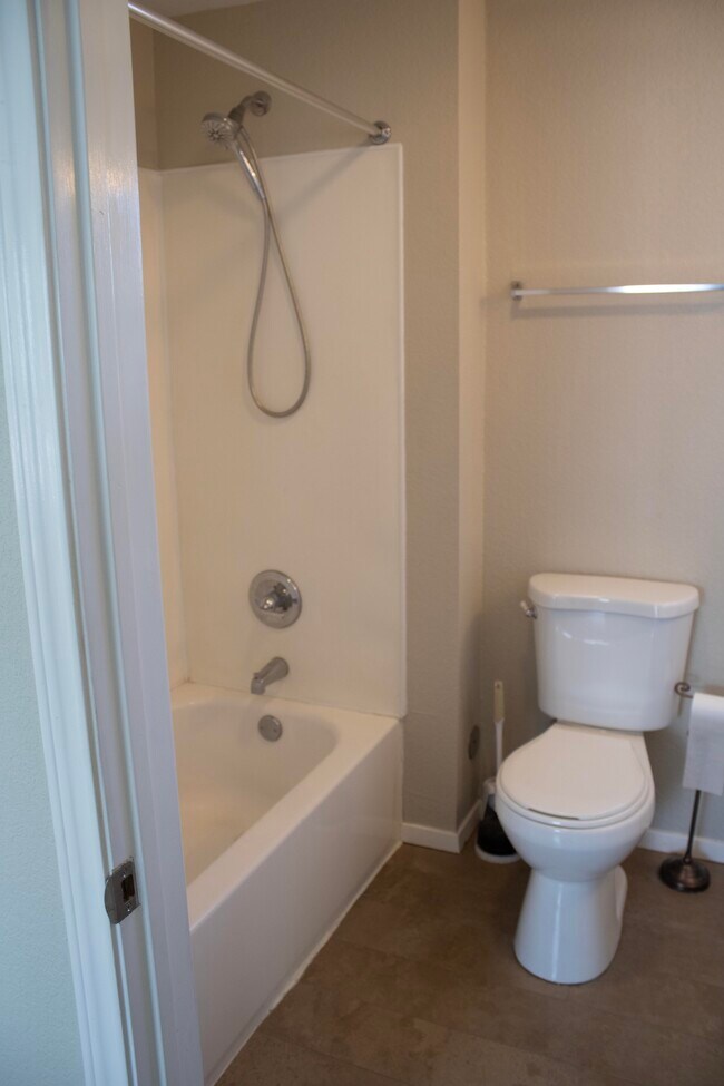 bathroom includes tub/shower, toilet, vanity and linen closet - 2534 Lipscomb St