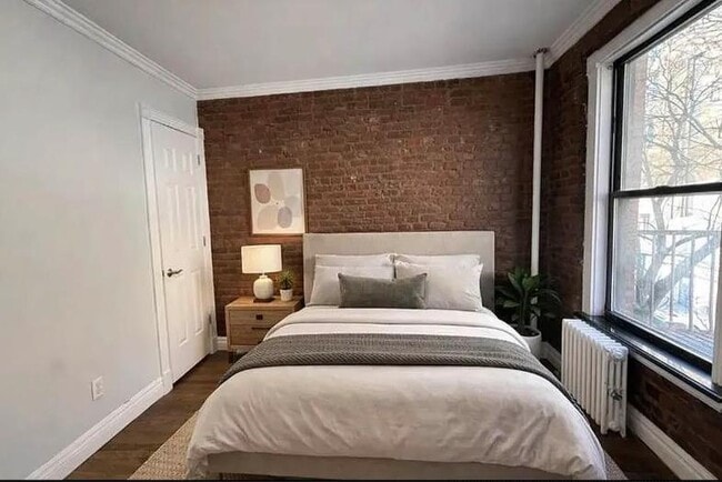 Foto del edificio - 410 E 13th St
