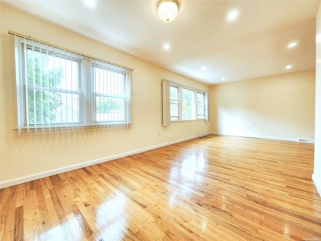 Building Photo - 221-21-221-59 59th Ave