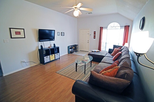 Large living room with high ceilings and lami - 19523 Maywood Falls Cir