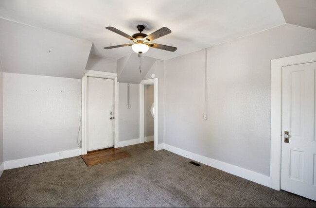Living room facing front door - 318 E Colorado Ave